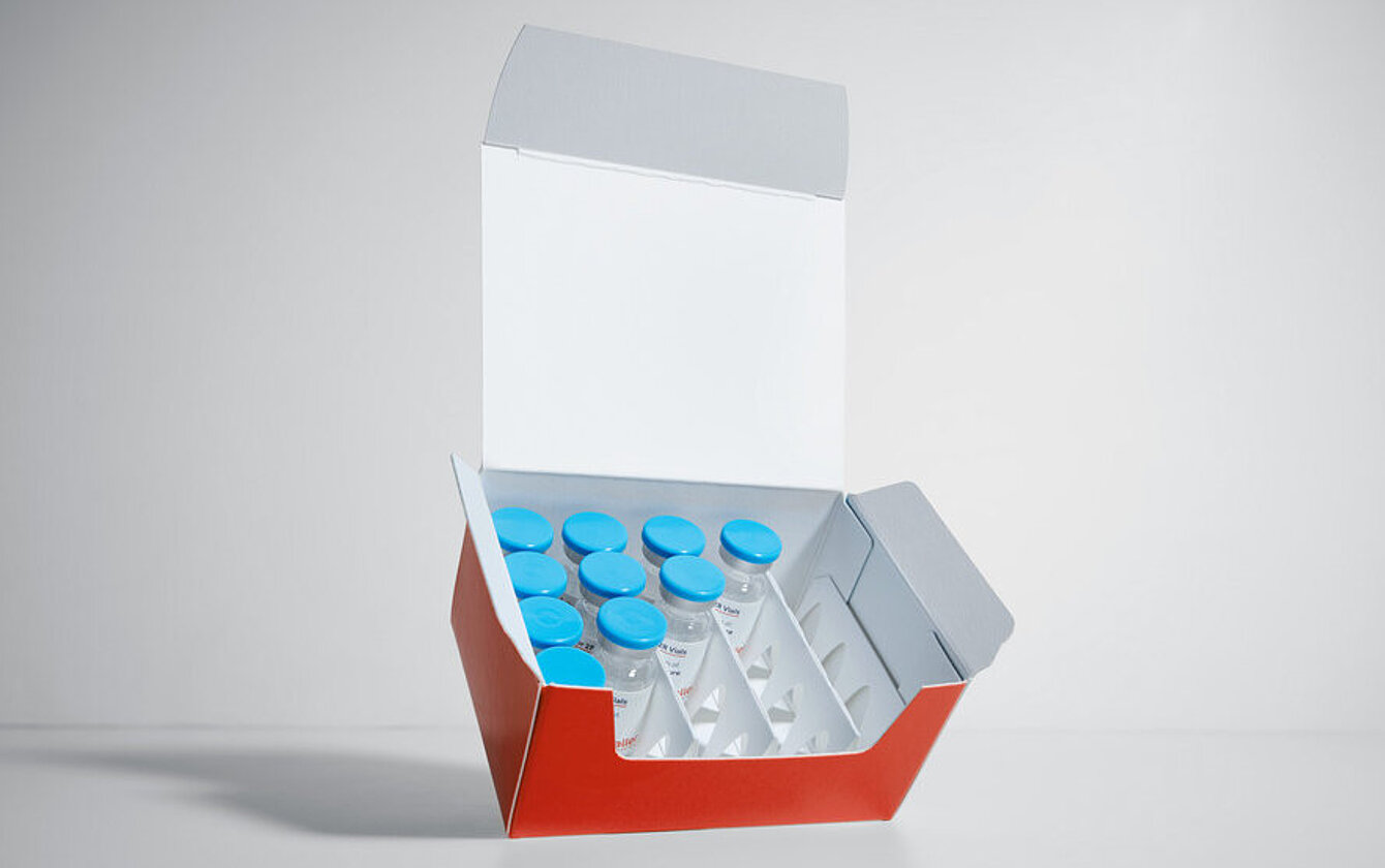 PrePackaging Service: folding carton from Faller Packaging with multiple pre-packaged vials for pharmaceutical products.