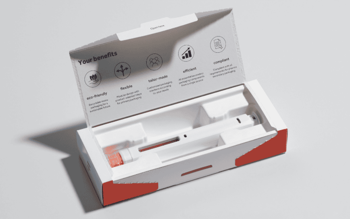 Open folding carton with moulded fibre tray and printed product benefits – sustainable, recyclable packaging solution.